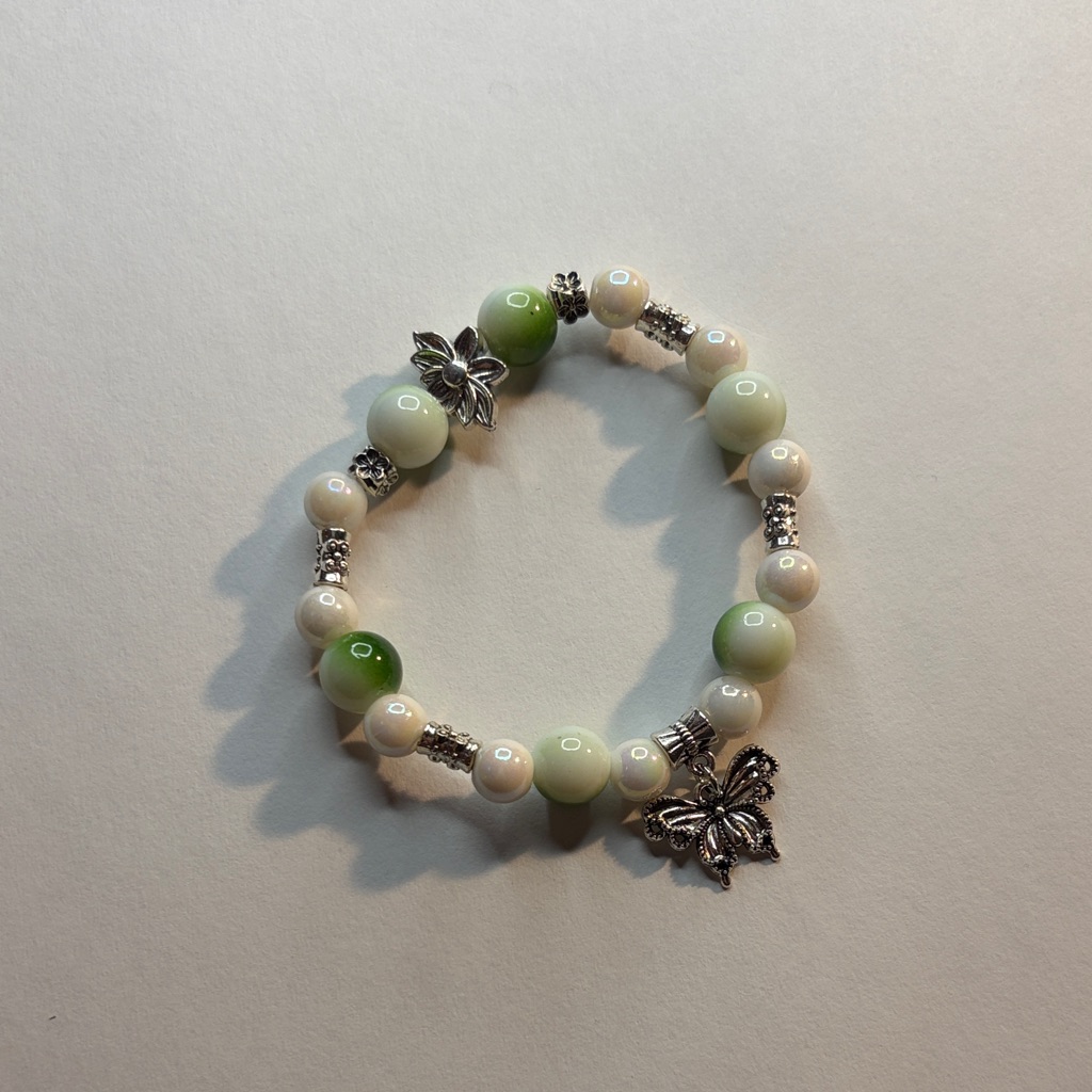 Elegant Green And White Beaded Bracelet With Silver Accents
